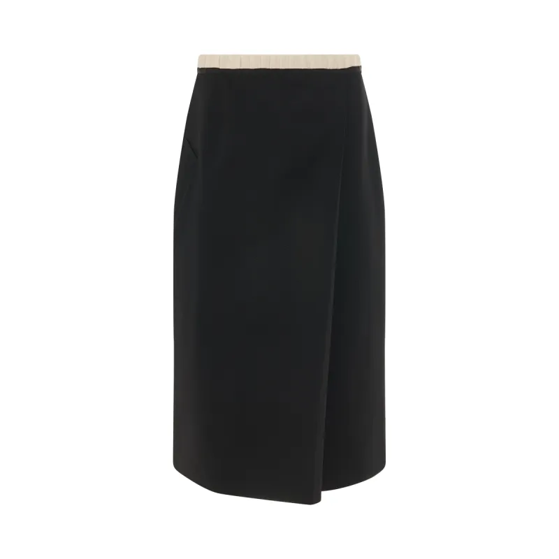 Wool Pencil Skirt in Black sold by MARAIS