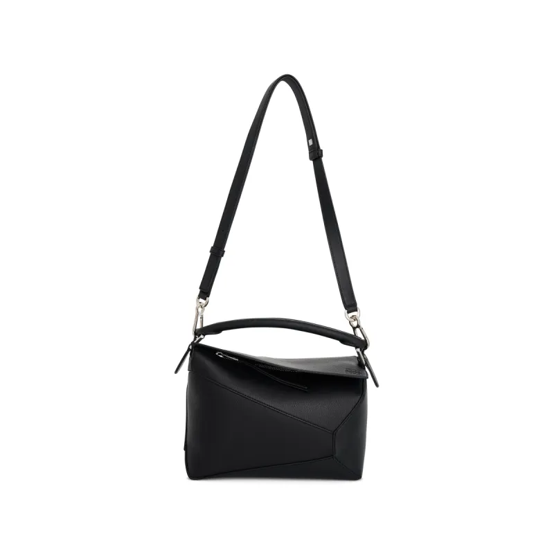 Small Puzzle Edge Bag in Black sold by MARAIS