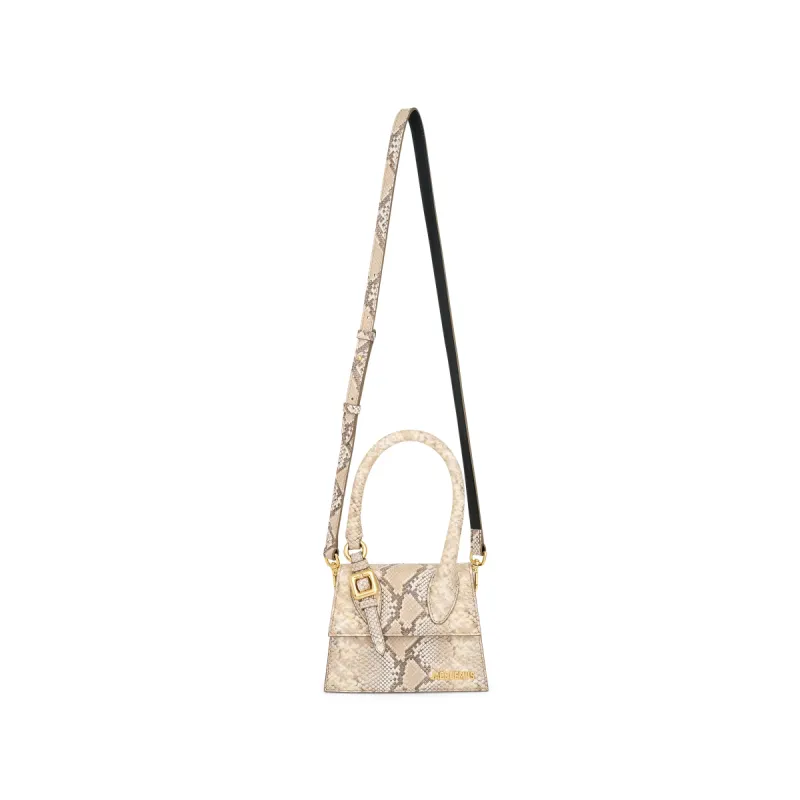 Le Chiquito Moyen Boucle Leather Bag in Beige sold by MARAIS