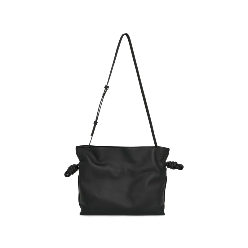 Flamenco Clutch Bag in Black sold by MARAIS