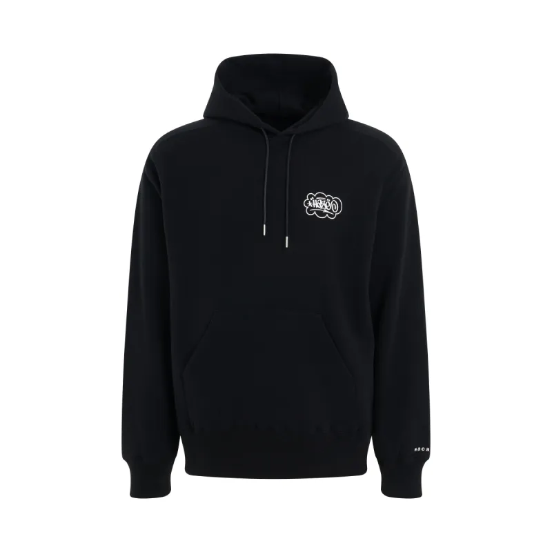 Eric Haze Circle Star Hoodie in Black made by Sacai