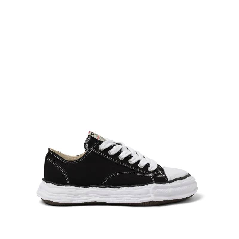 Peterson 23 OG Sneaker in Black/White sold by MARAIS