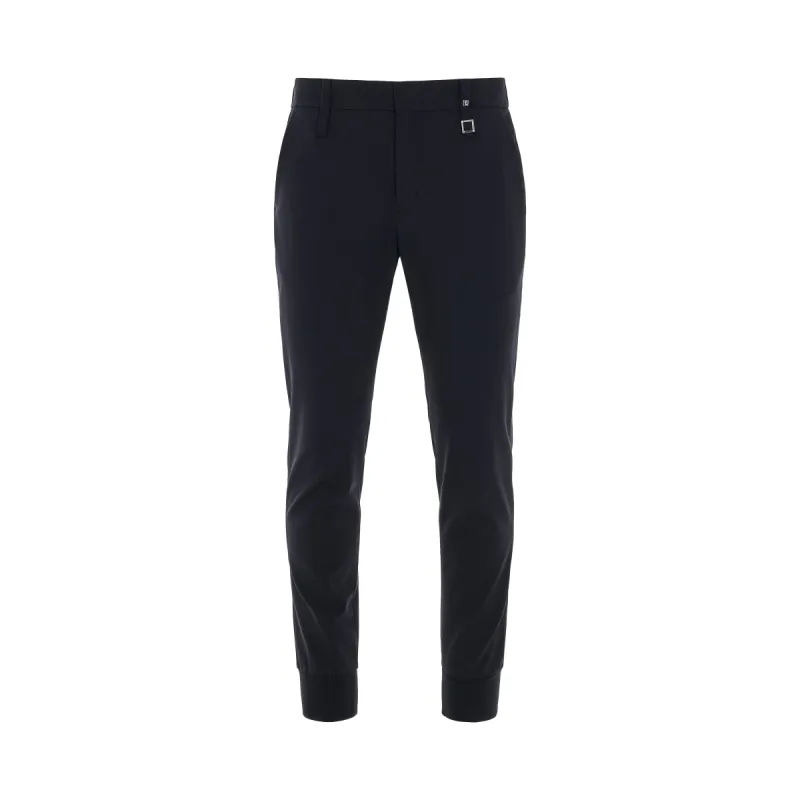 Elasticated Cuff Pants in Navy sold by MARAIS
