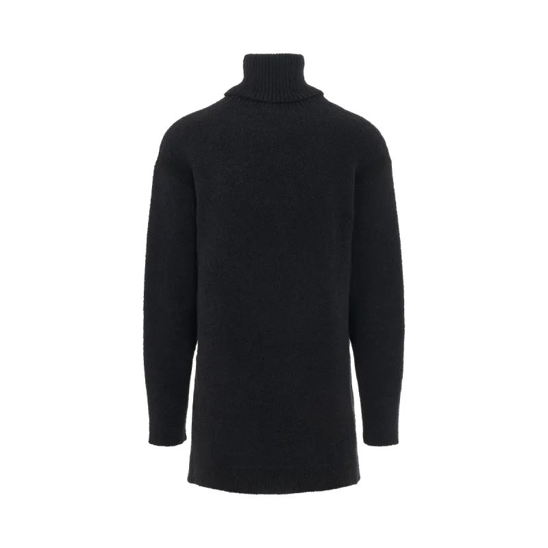 Micro Boucle Knit Turtleneck in Black sold by MARAIS