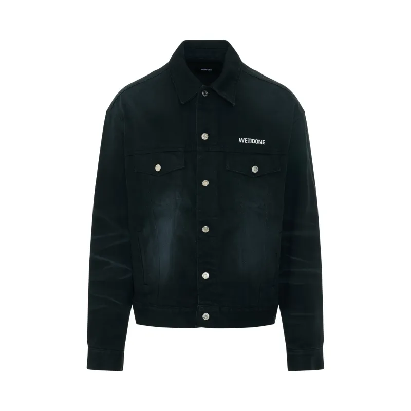 Logo Dirty Washed Denim Trucker Jacket in Black sold by MARAIS