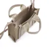 Small Woody Tote Bag in Wild Grey sold by MARAIS