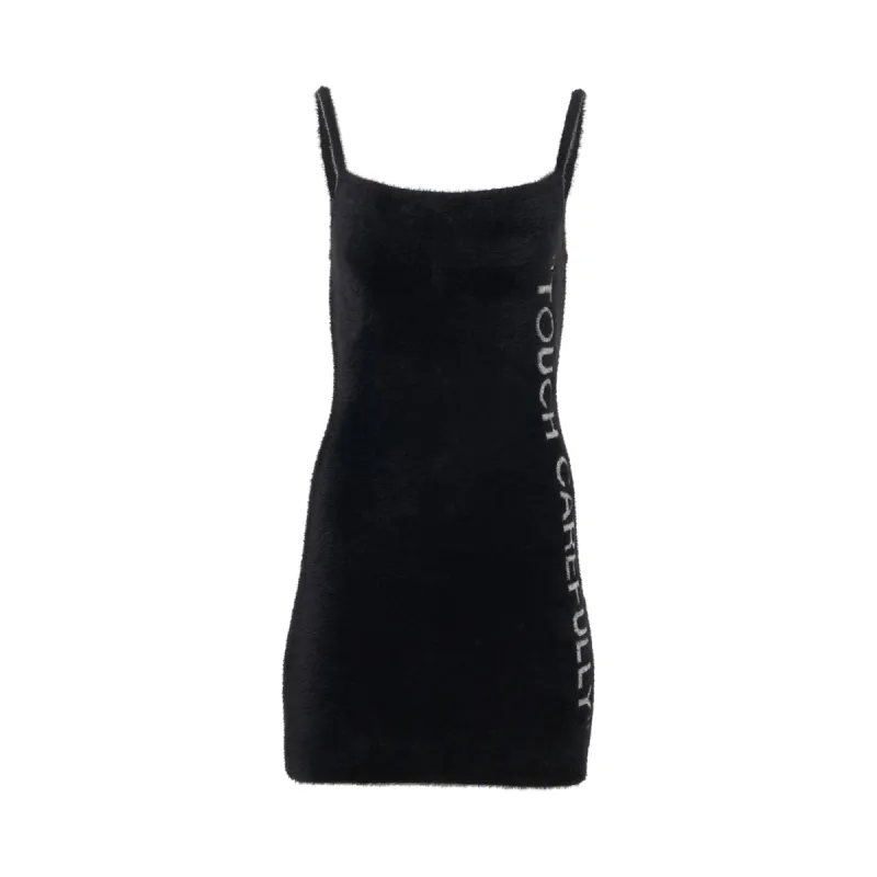 Quote Fuzzy Mini Dress in Black/White sold by MARAIS