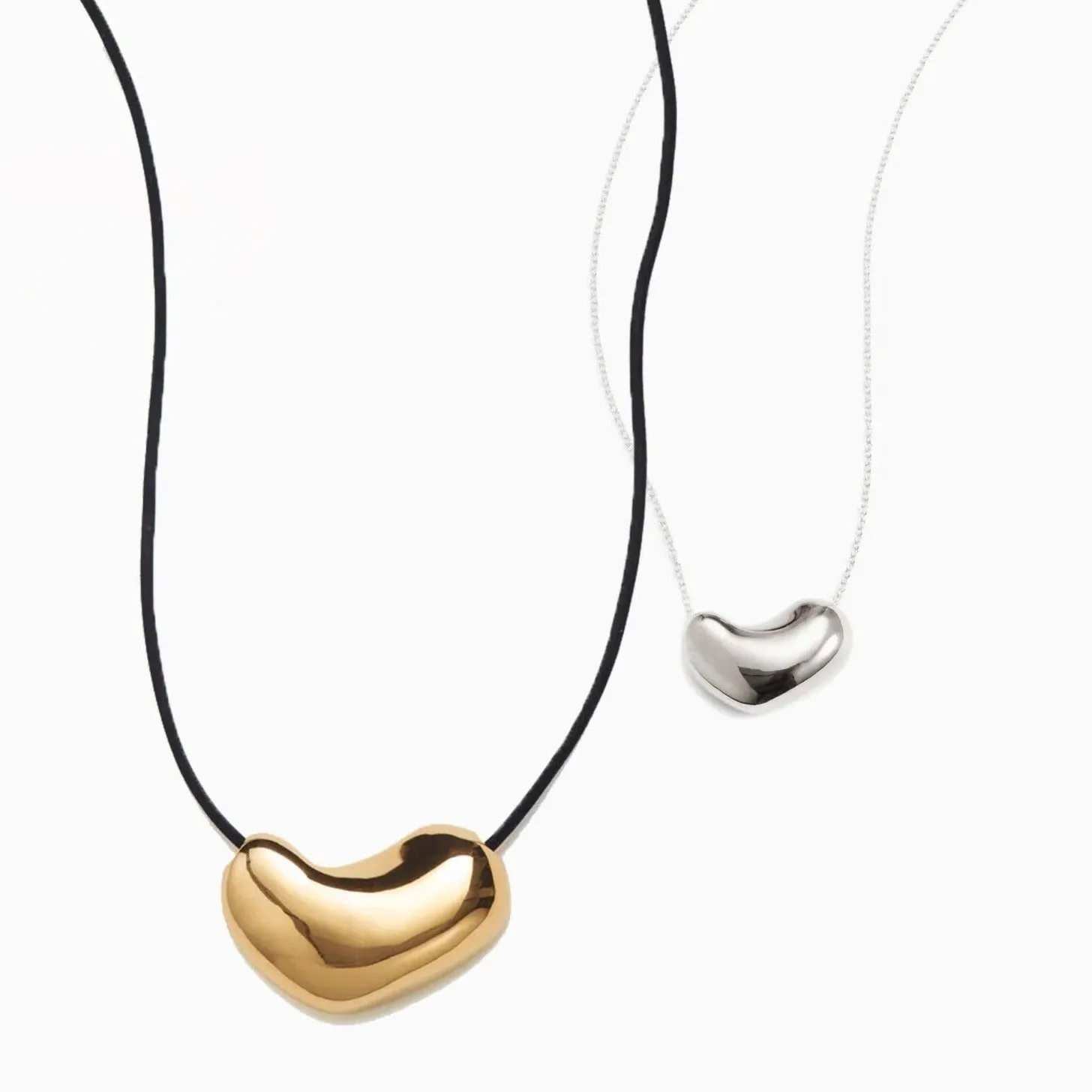 Small Sculpted Heart Pendant + Sculpted Heart Pendant sold by AGMES