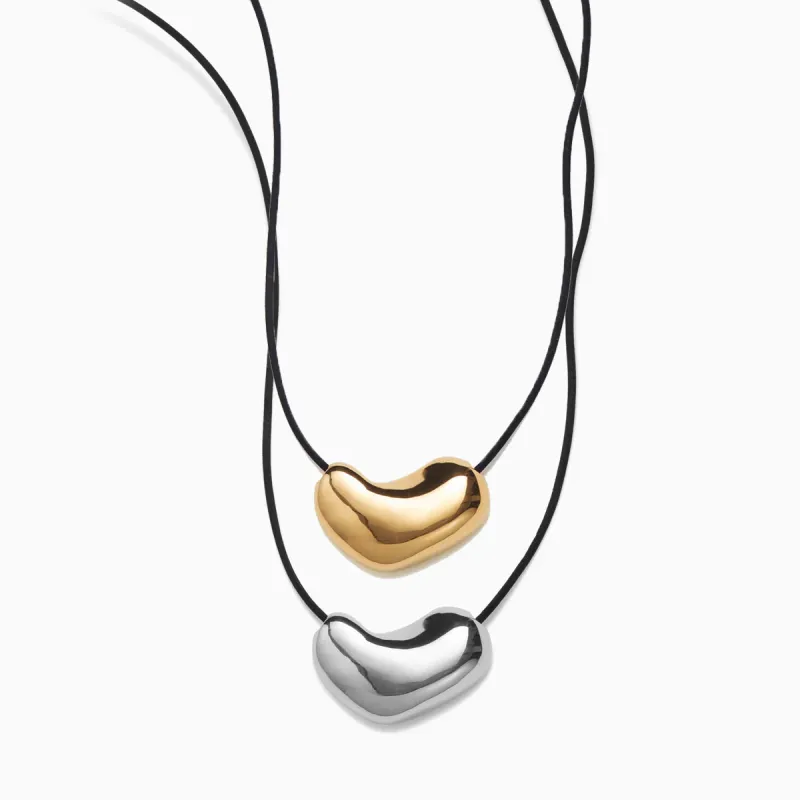 Sculpted Heart Pendants Set sold by AGMES