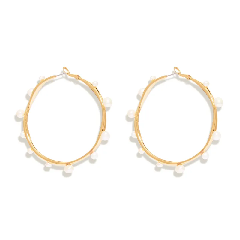 Isla Pearl Hoop Earrings sold by Mignonne Gavigan