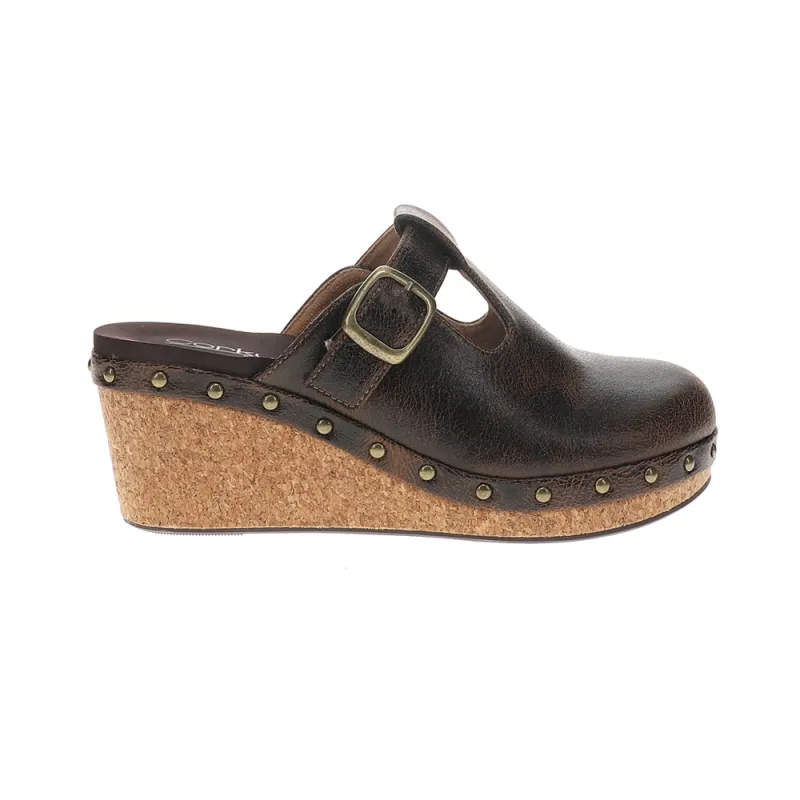 In The Moment Studded Mule Clogs sold by Shoebacca