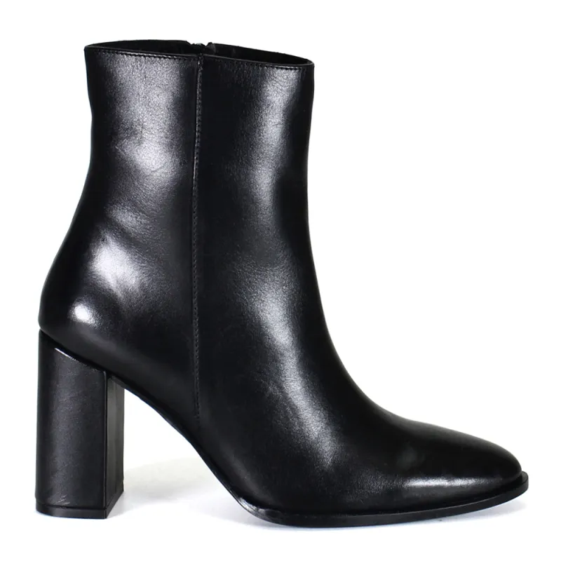 Trav Ler Pointed Toe Zippered Booties sold by Shoebacca