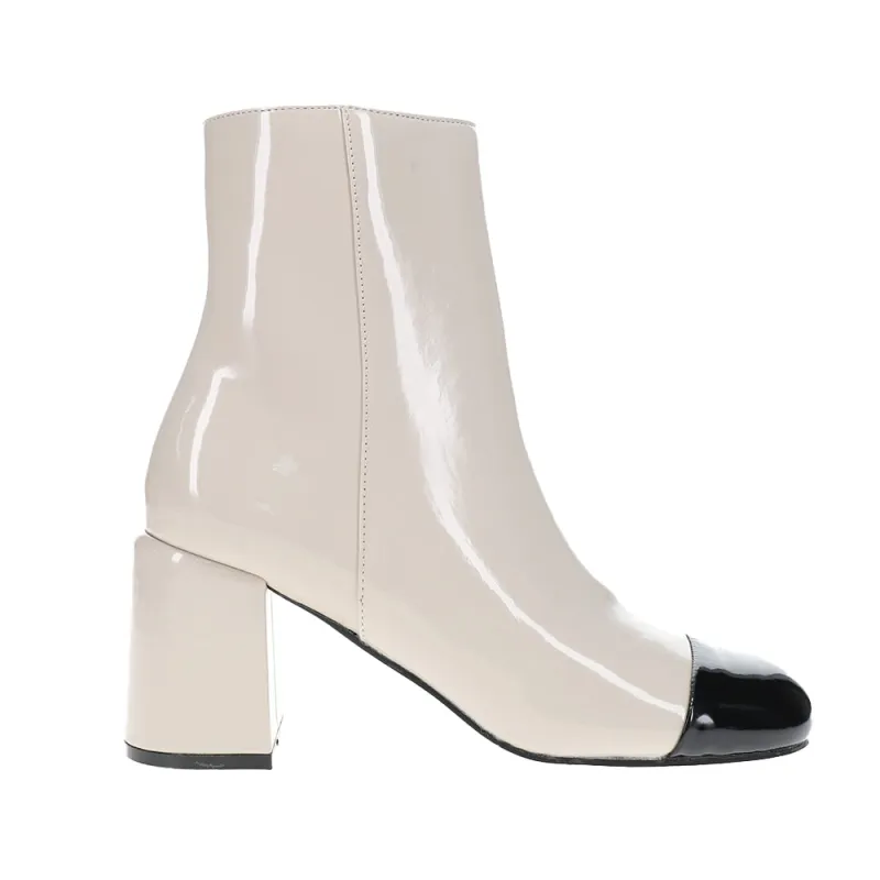 Valentina Zippered Round Toe Booties sold by Shoebacca