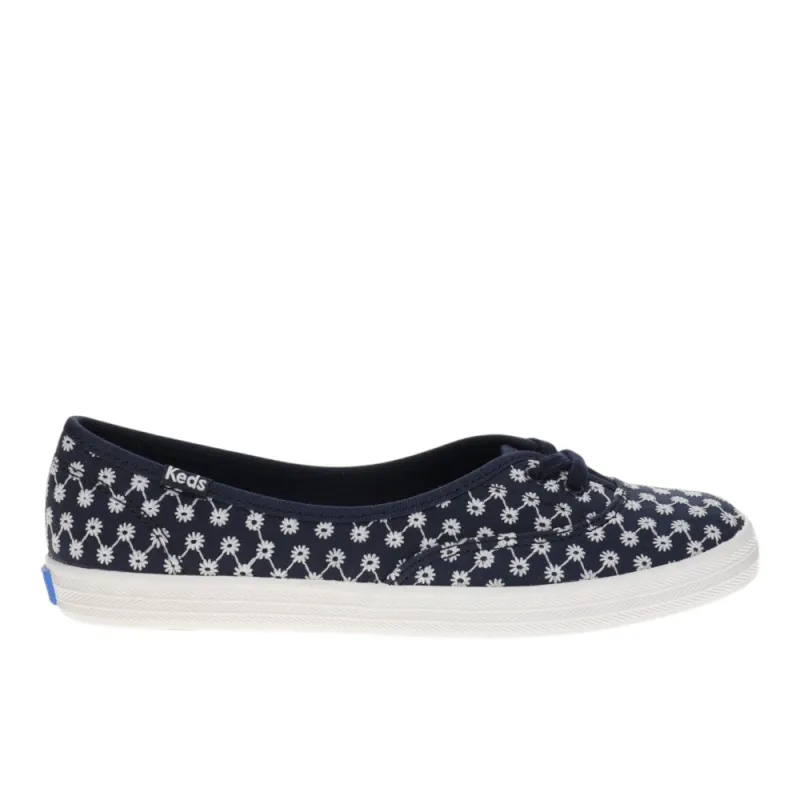 The Mini Daisy Eyelet Slip On Sneakers made by Keds