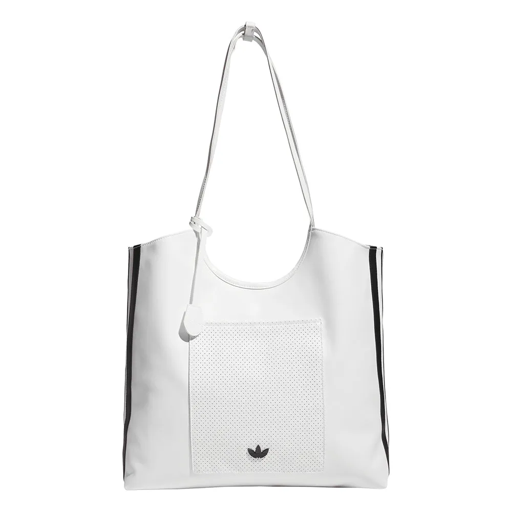 Perforated PU Tote sold by Shoebacca