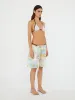 Crimped Bahia Short sold by Christopher Esber