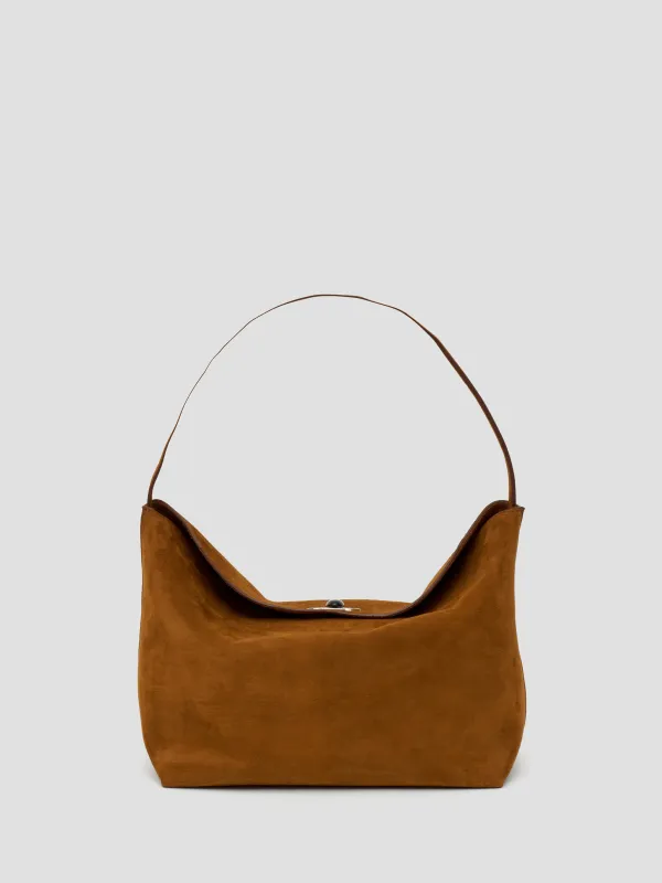 Turnlock Suede Shoulder Bag sold by Christopher Esber