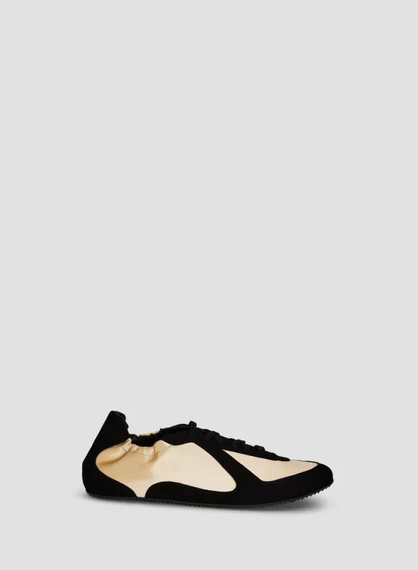 Roadie Satin Sneaker sold by Christopher Esber