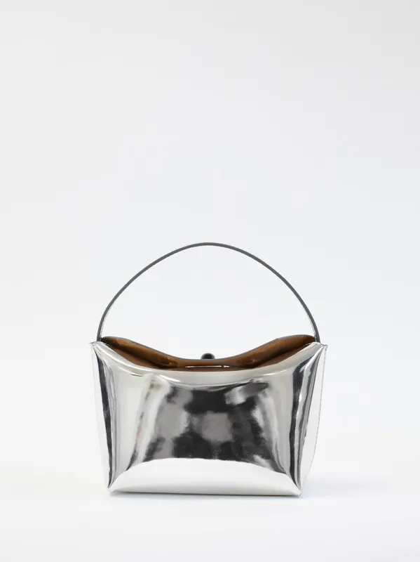 Turnlock Metallic Mini Bag sold by Christopher Esber