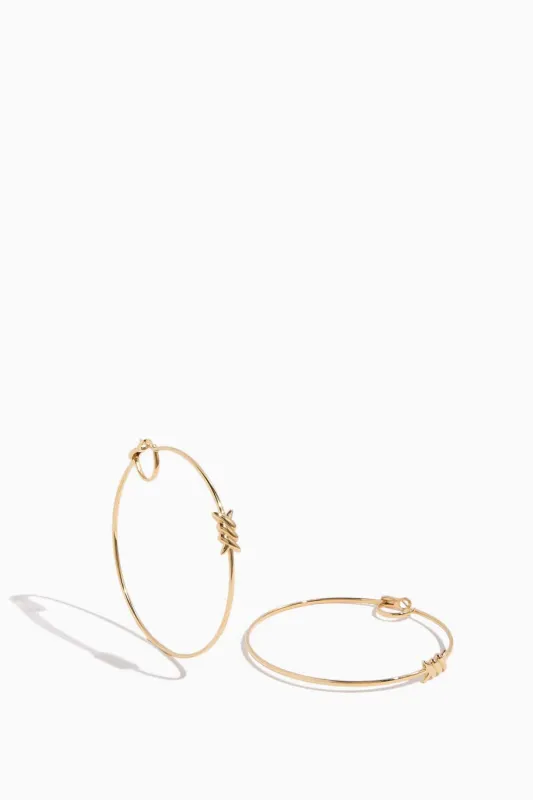 Barb Hoop Earrings in 18k Yellow Gold made by Stoned Fine Jewelry