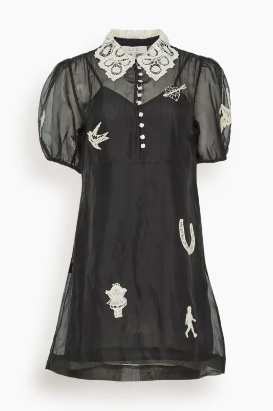 Ellison Solid Puff Sleeve Mini Dress in Black made by Sea