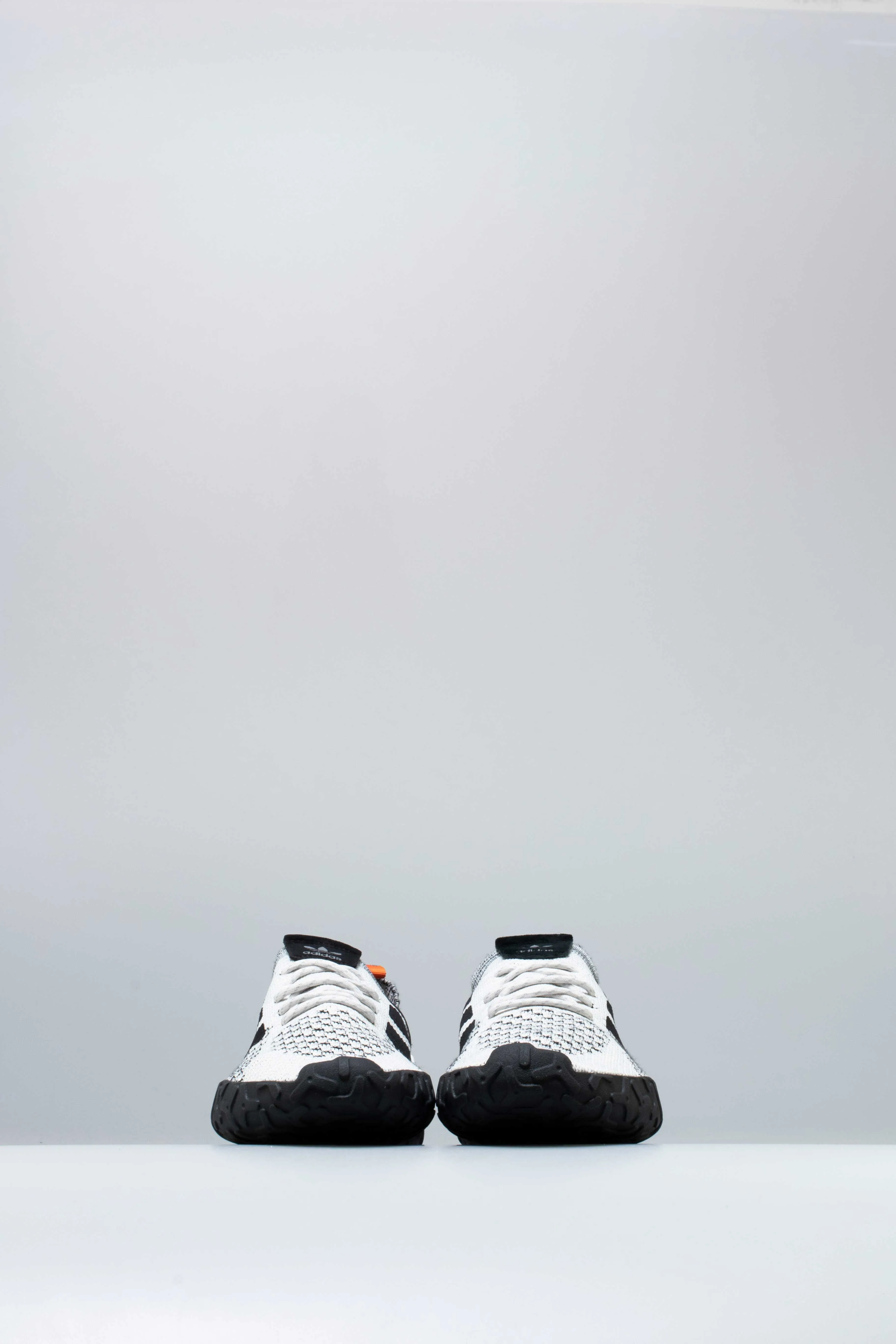Atric F/22 Primeknit Mens Shoe - Crystal White/Core Black/Trace Orange sold by Nice Kicks Retail product image thumbnail 2