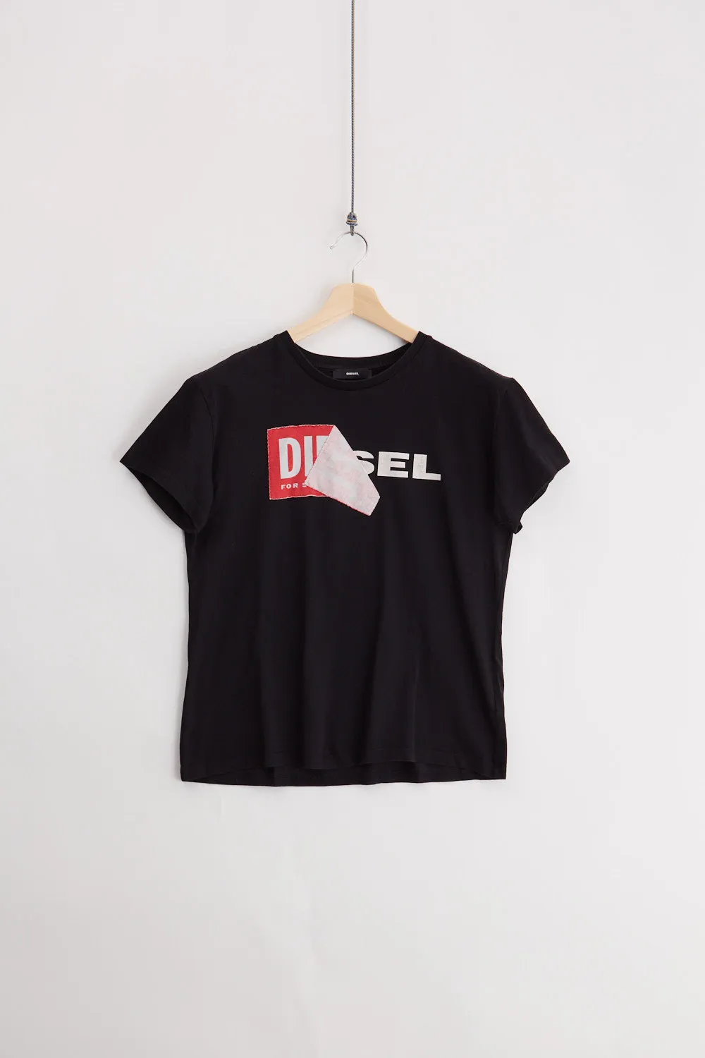 Diesel Tee (L) sold by Livid Jeans