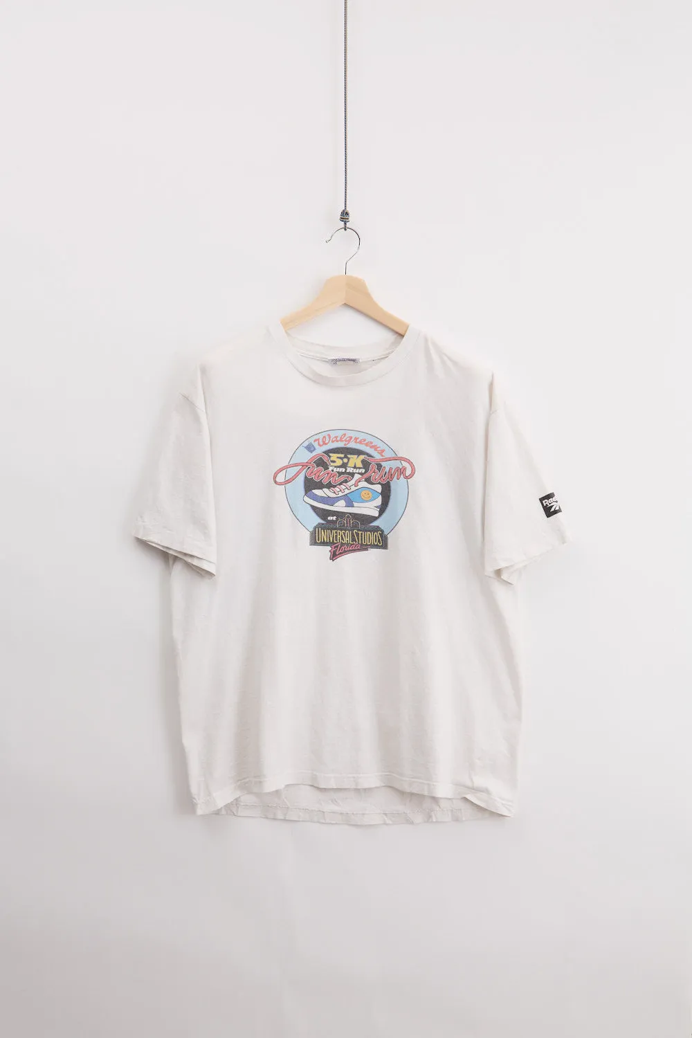 90's Reebok Universal Studios Running Tee (XL) sold by Livid Jeans