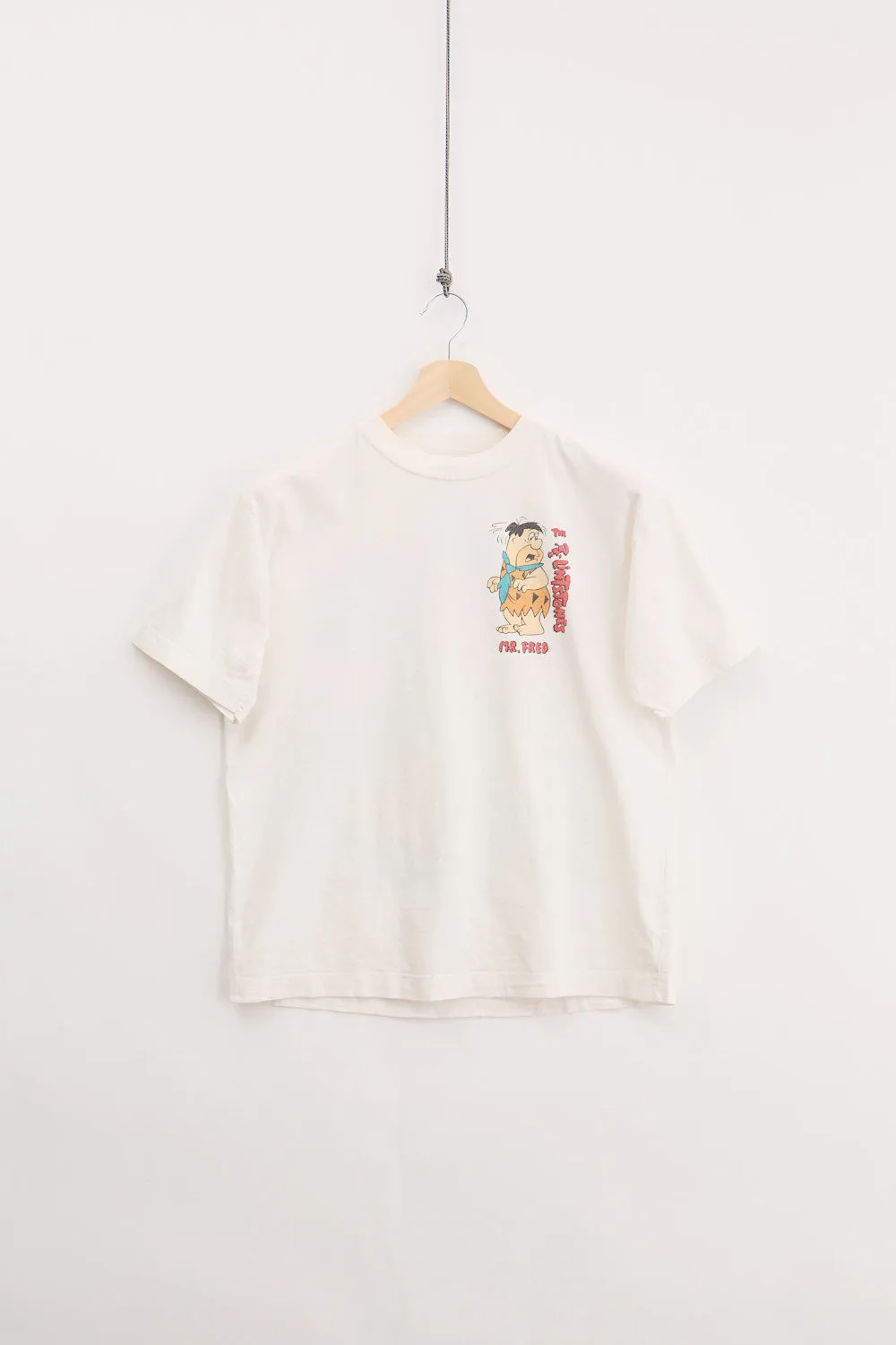 90's Flintstones Tee (L) sold by Livid Jeans