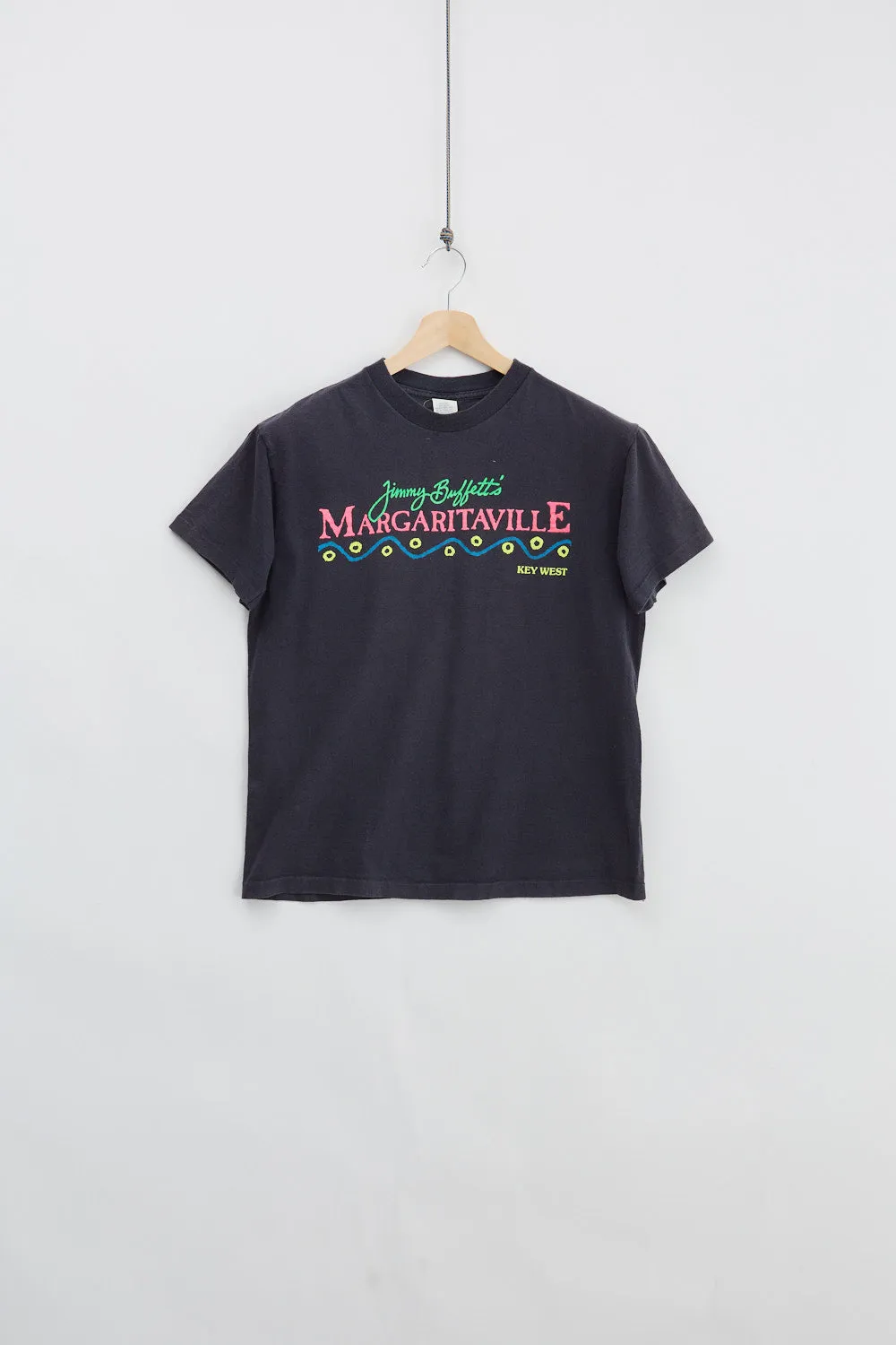 Margaritaville Tee (L) sold by Livid Jeans