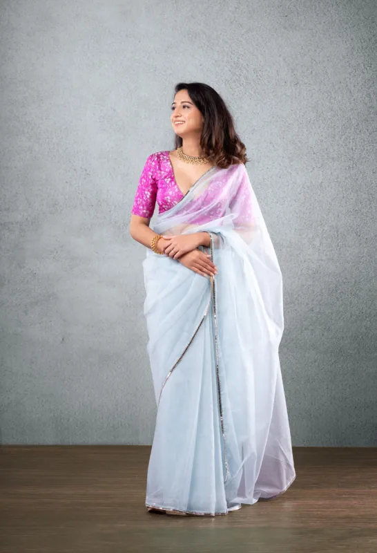 Pink Brocade Blouse with Light Blue Saree made by Dri by Himadri