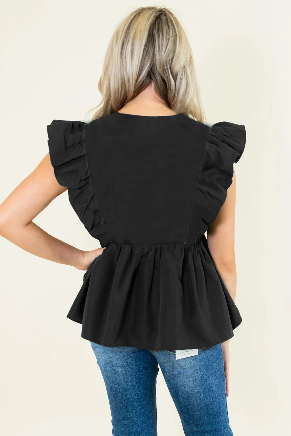 Black Contrast Ricrac Trim Ruffled V Neck Peplum Top sold by Beagle Boutique product image thumbnail 2