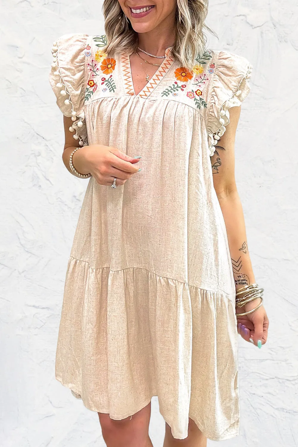 Linen Embroidery Split Neck Pom Pom Ruffle Sleeves Flowy Short Dress sold by Beagle Boutique product image thumbnail 4