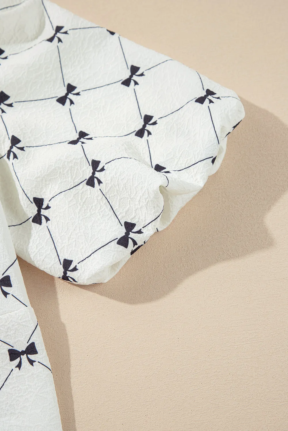 White Bowknot Print Front Knots Bubble Sleeve Blouse sold by Beagle Boutique product image thumbnail 4