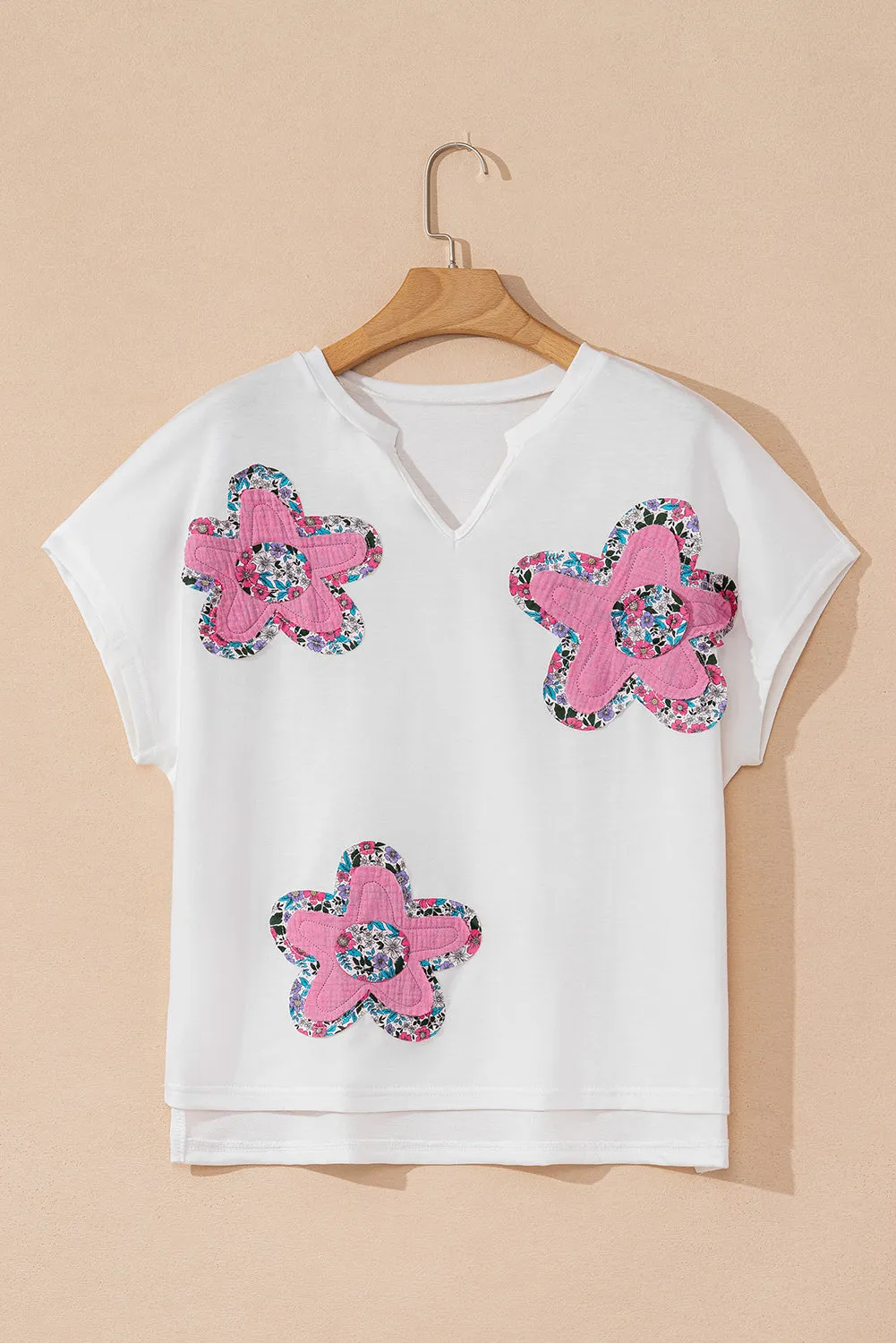 White Floral Applique Notched V Neck Dolman Sleeve Top sold by Beagle Boutique product image thumbnail 4