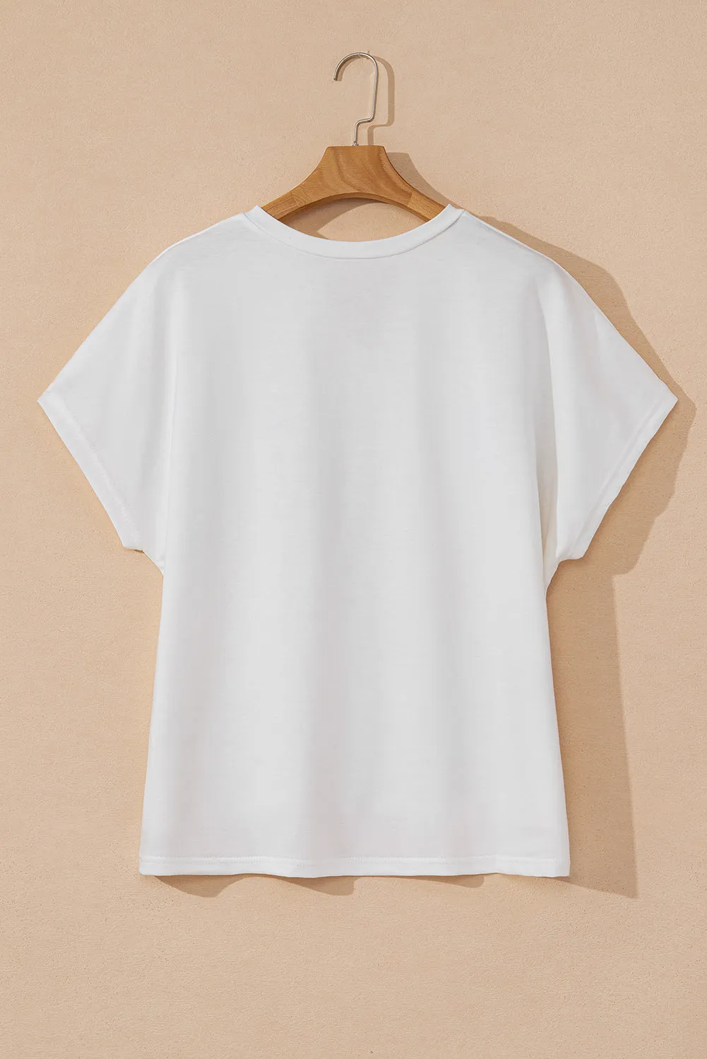 White Floral Applique Notched V Neck Dolman Sleeve Top sold by Beagle Boutique product image thumbnail 5