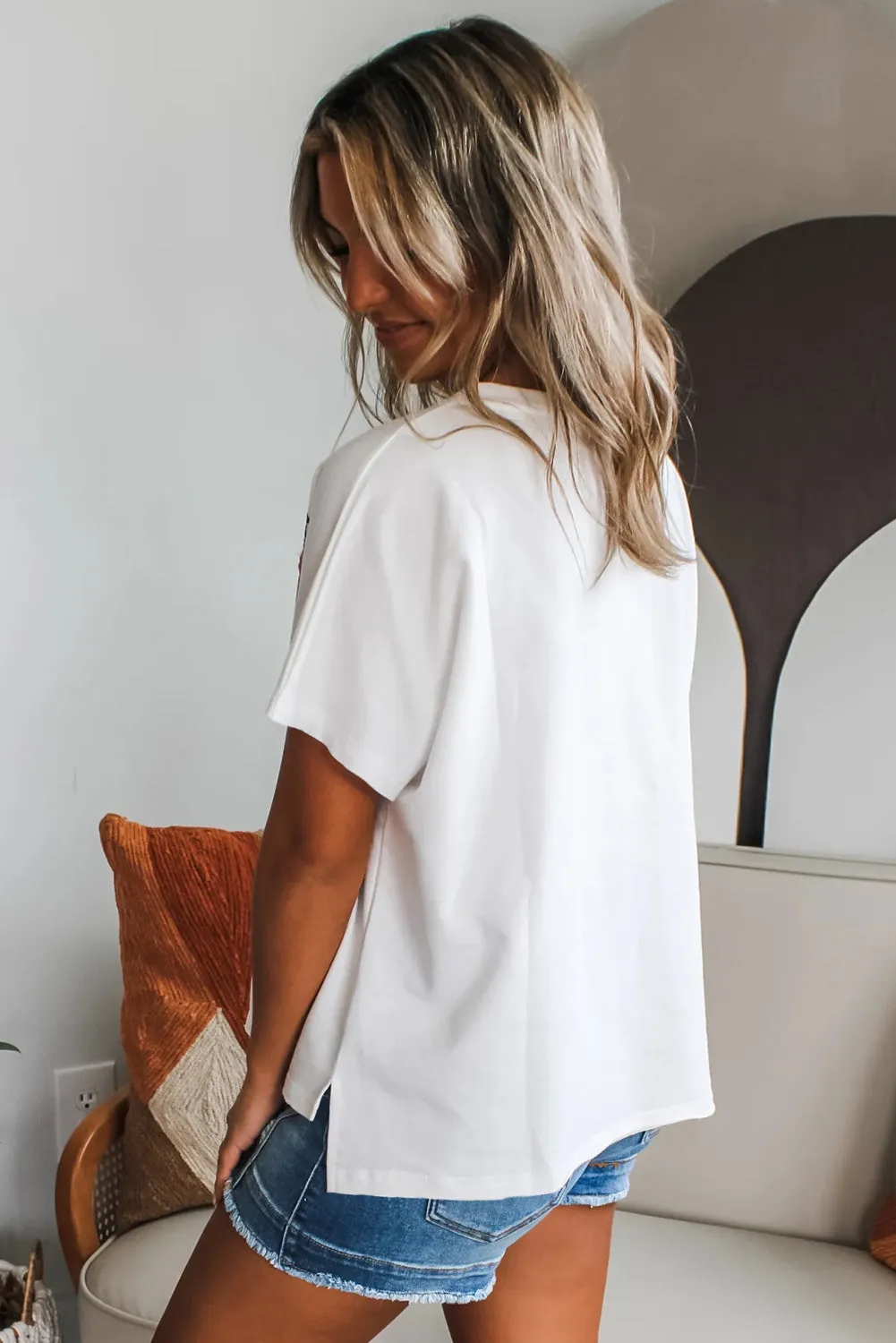 White Floral Applique Notched V Neck Dolman Sleeve Top sold by Beagle Boutique product image thumbnail 2