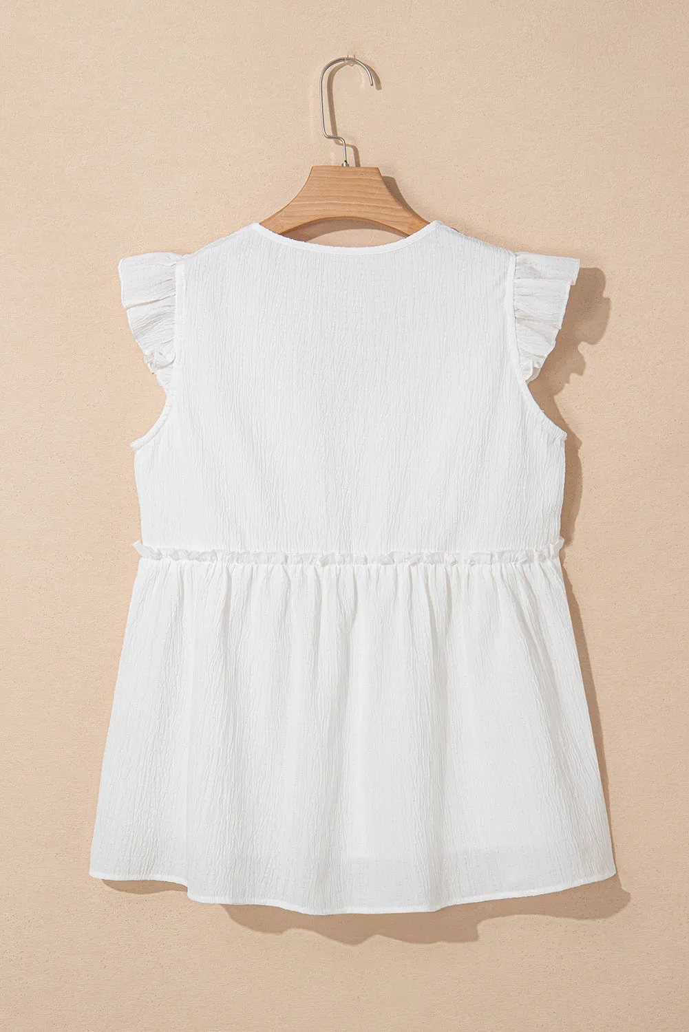 White Textured Ruffled Trim V Neck Flutter Flowy Top sold by Beagle Boutique product image thumbnail 4