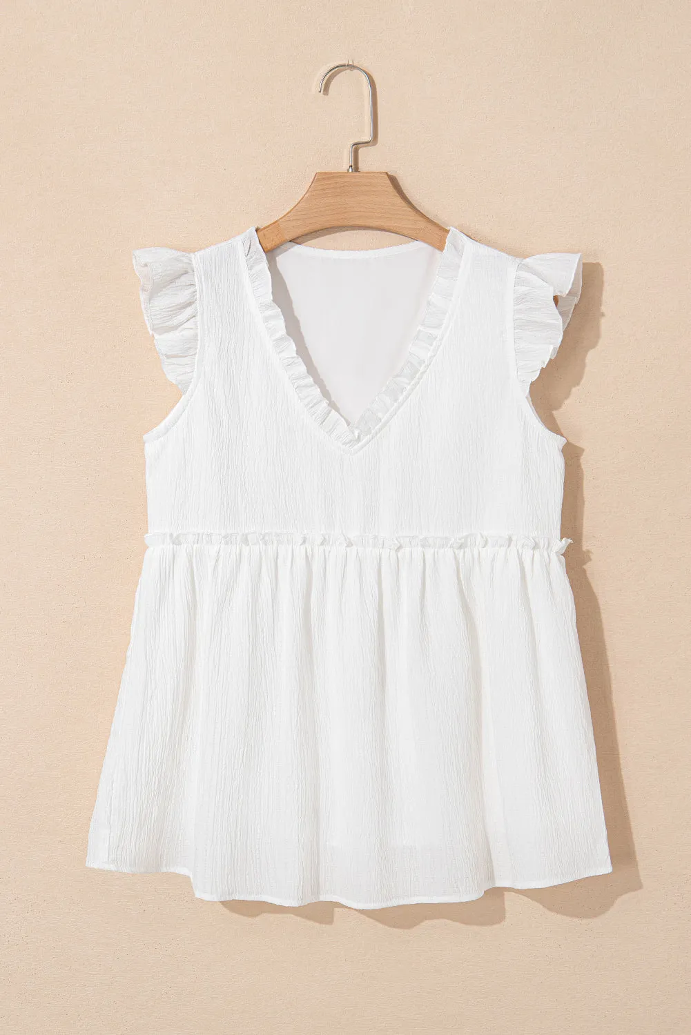 White Textured Ruffled Trim V Neck Flutter Flowy Top sold by Beagle Boutique product image thumbnail 3