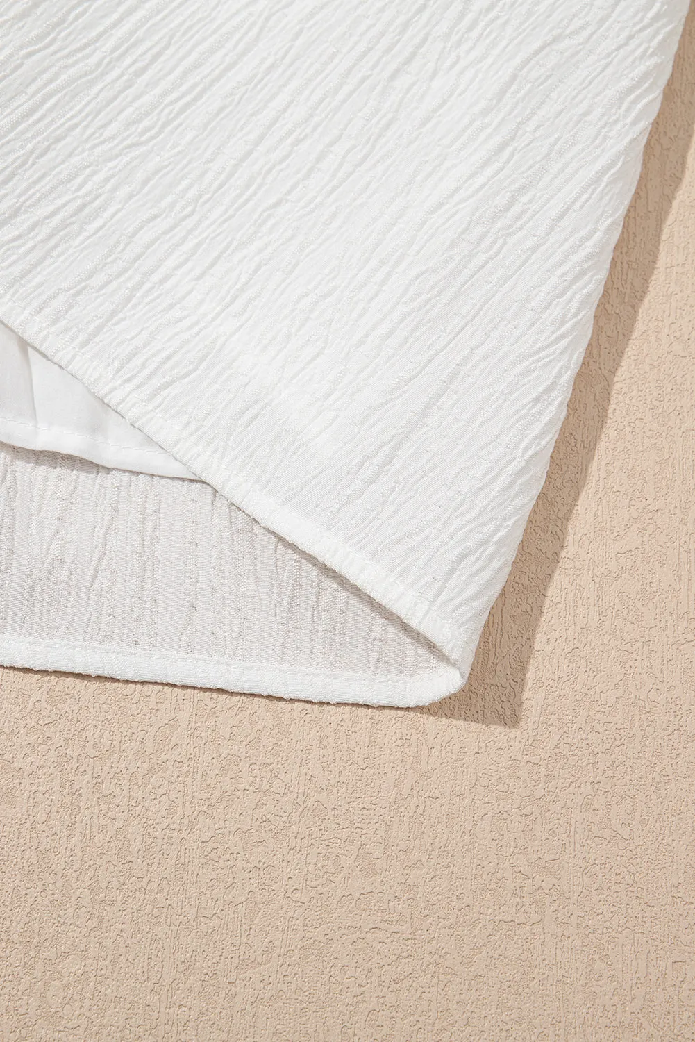 White Textured Ruffled Trim V Neck Flutter Flowy Top sold by Beagle Boutique product image thumbnail 5