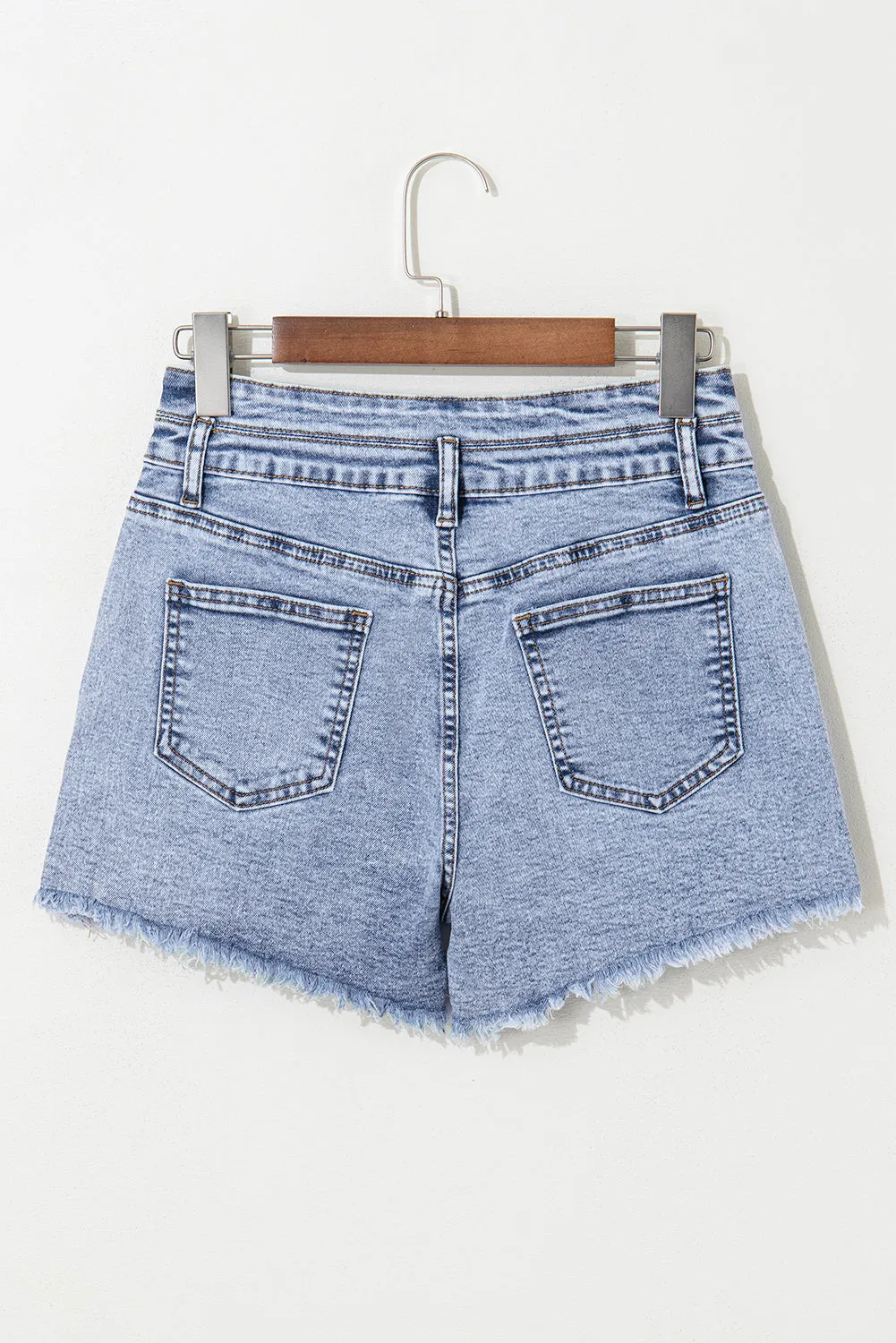 Beau Blue Rhinestone Light Wash Raw Hem High Waist Denim Shorts sold by Beagle Boutique product image thumbnail 4
