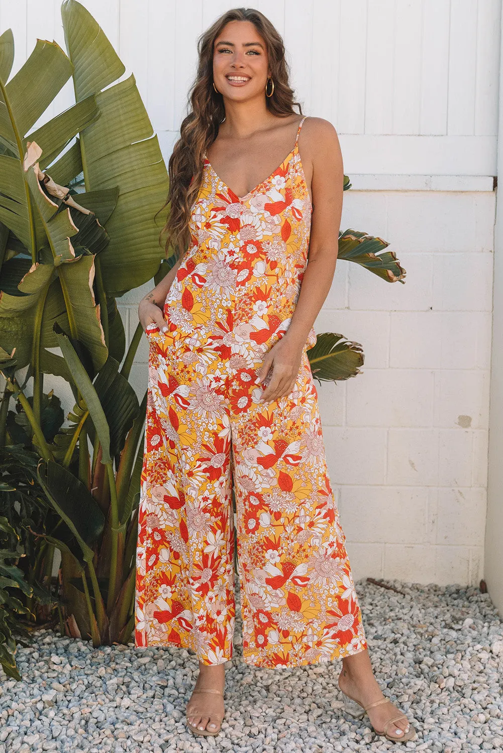Orange Floral V Neck Wide Leg Sleeveless Jumpsuit sold by Beagle Boutique