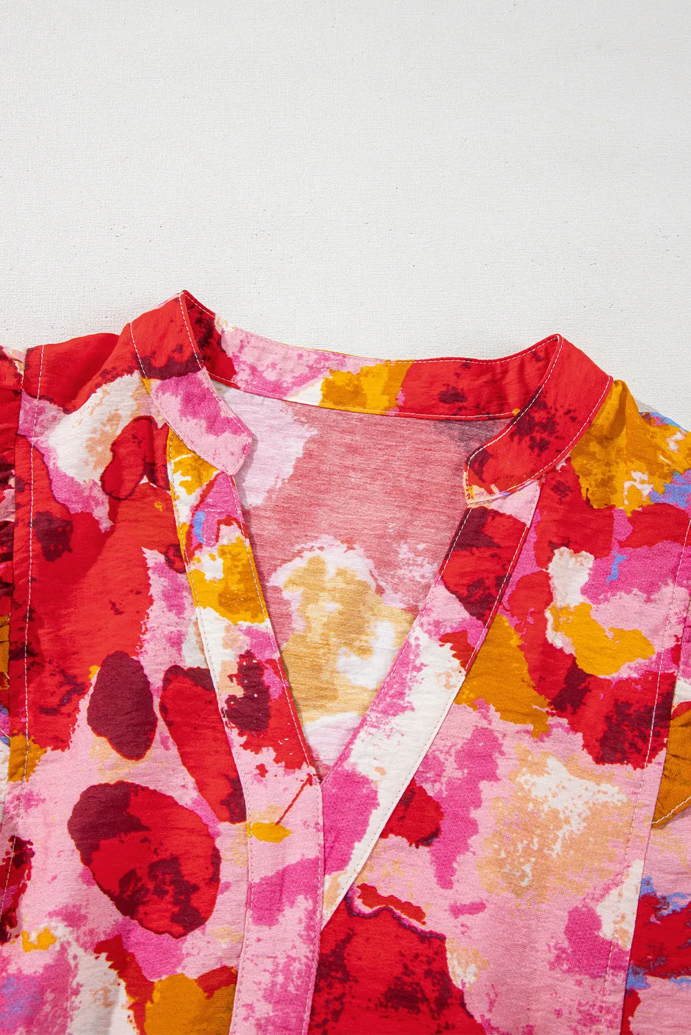 Red Abstract Print Split V Neck Ruffle Short Sleeve Blouse sold by Beagle Boutique product image thumbnail 5