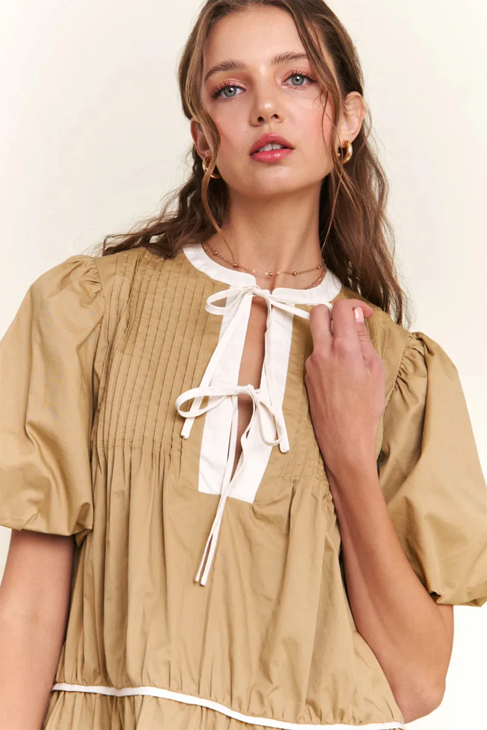 Pale Khaki Contrast Trim Pintuck Puff Sleeve Tied Neck Short Dress sold by Beagle Boutique product image thumbnail 4