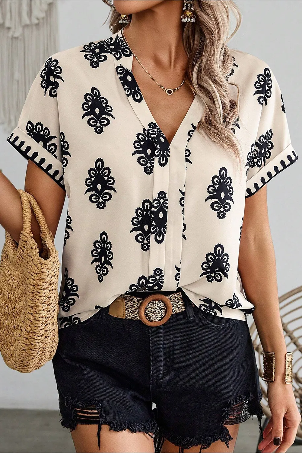 Black Geometric Print Short Sleeve V Neck Blouse sold by Beagle Boutique product image thumbnail 5
