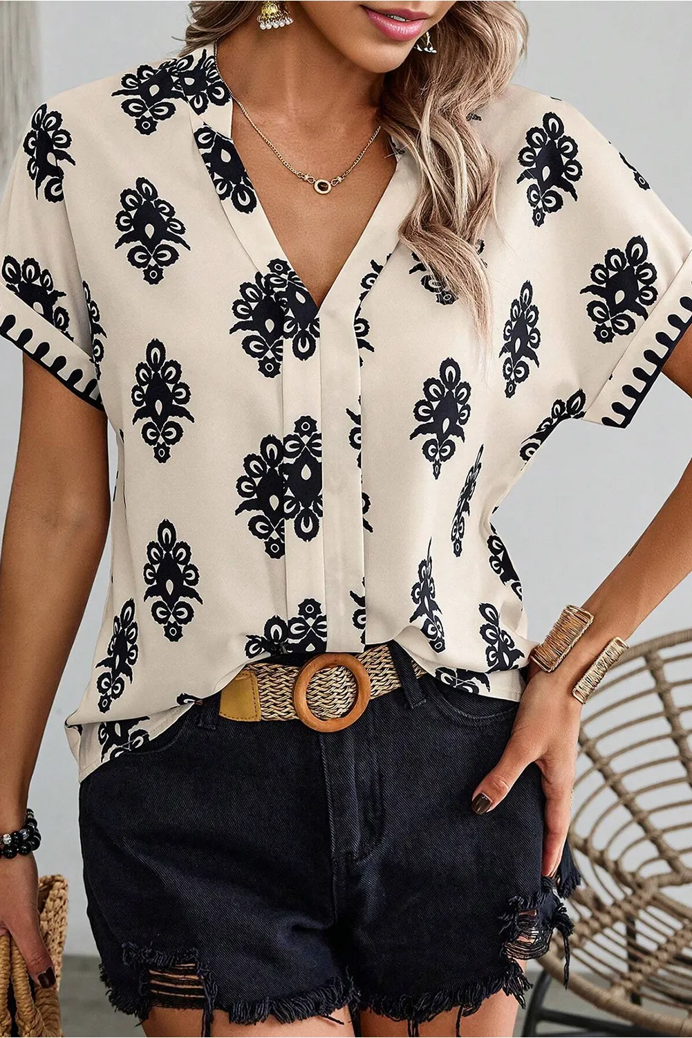 Black Geometric Print Short Sleeve V Neck Blouse sold by Beagle Boutique product image thumbnail 3