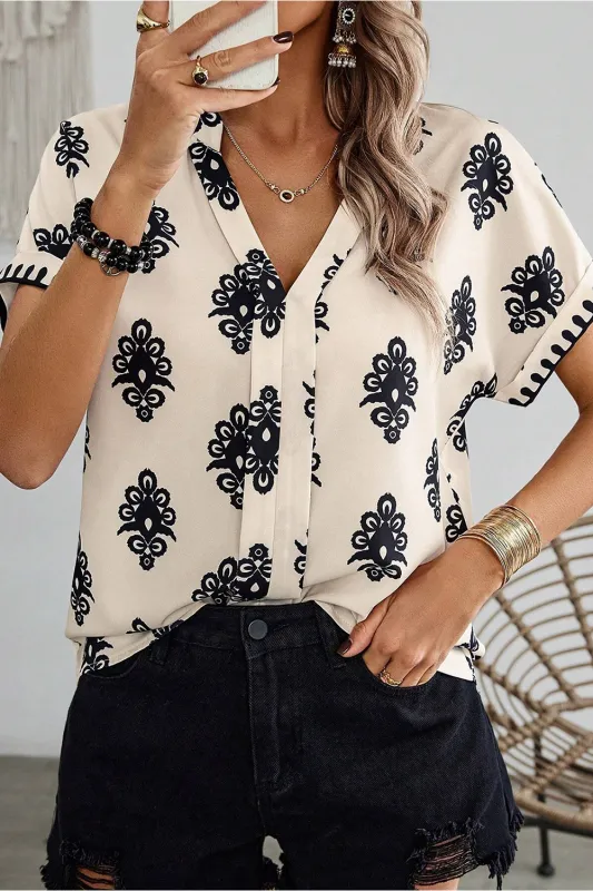 Black Geometric Print Short Sleeve V Neck Blouse sold by Beagle Boutique