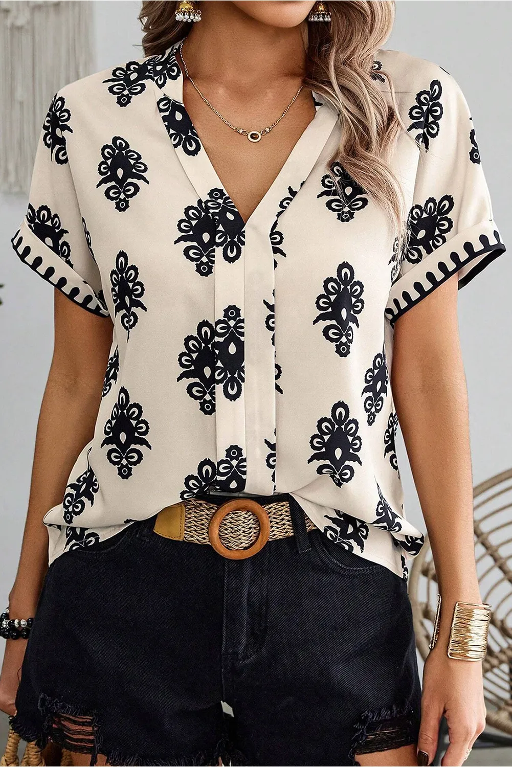 Black Geometric Print Short Sleeve V Neck Blouse sold by Beagle Boutique product image thumbnail 4