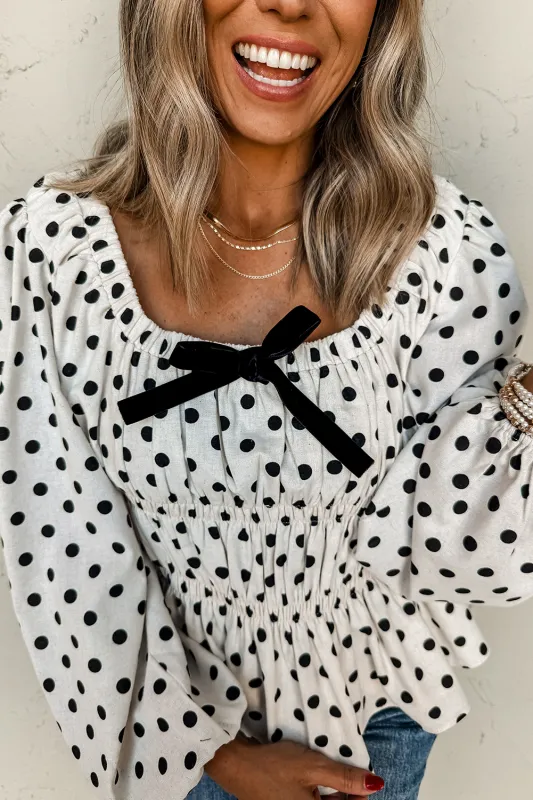 Black Polka Dot Puff Sleeve Bow Square Neck Peplum Top sold by Beagle Boutique