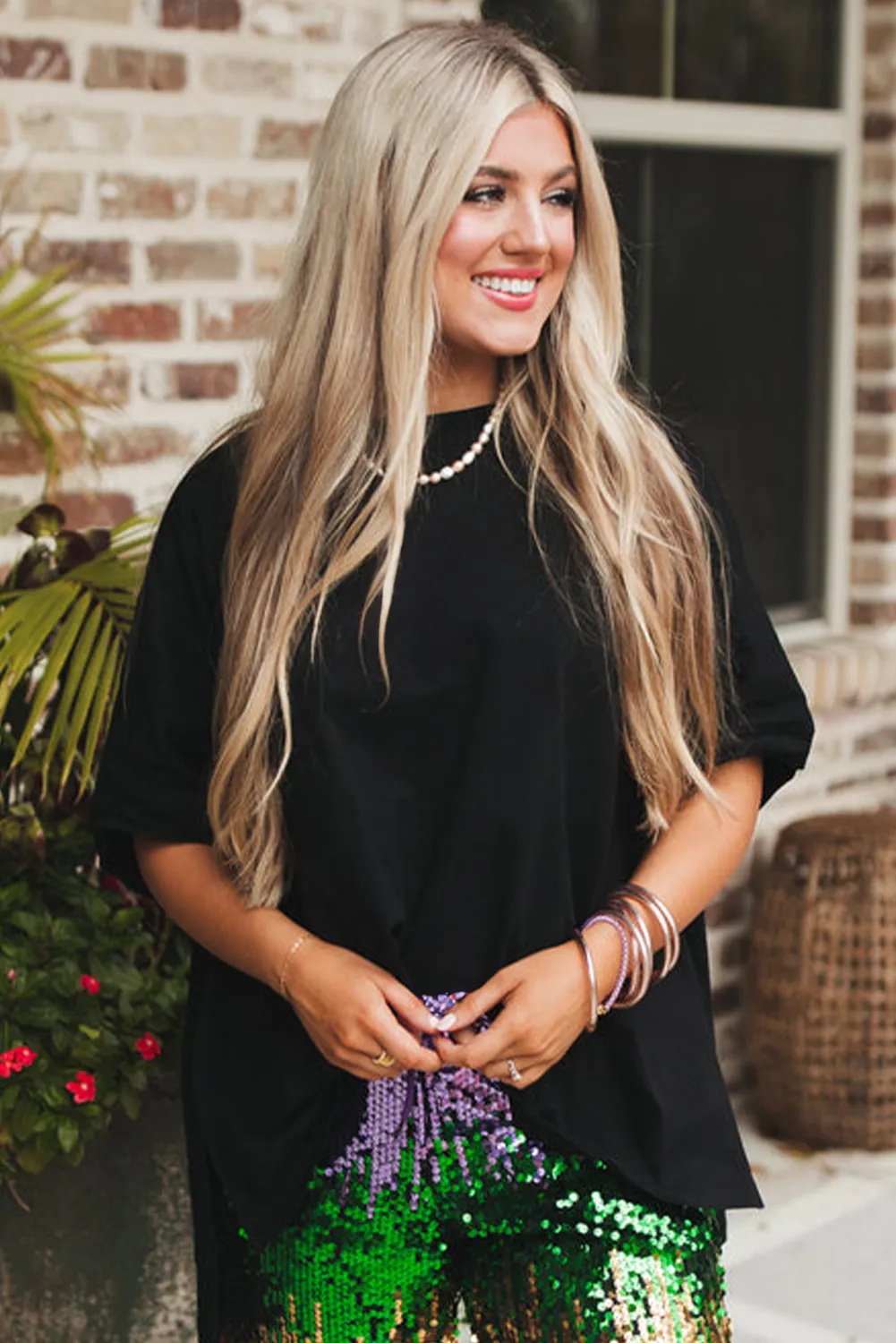 Black Loose Half Sleeve Hi Low Hem T Shirt sold by Beagle Boutique product image thumbnail 4